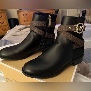New MK womens short boots. Never worn. Black and Brown.